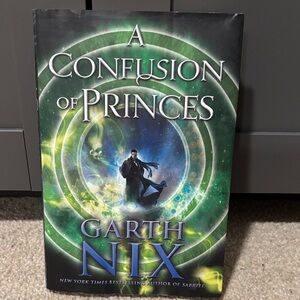 A Confusion of Princes by Garth Nix - Green and Black Cover